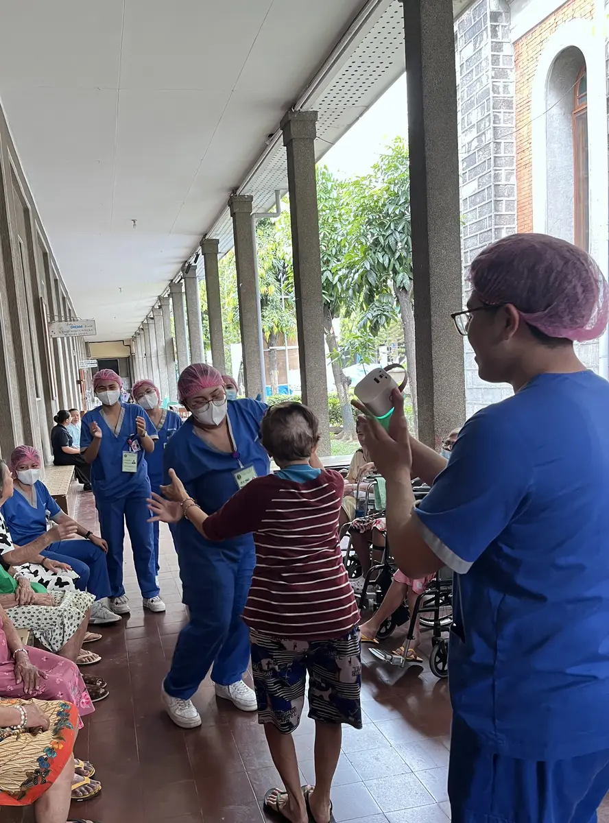 Healthcare students engaging with members of the community